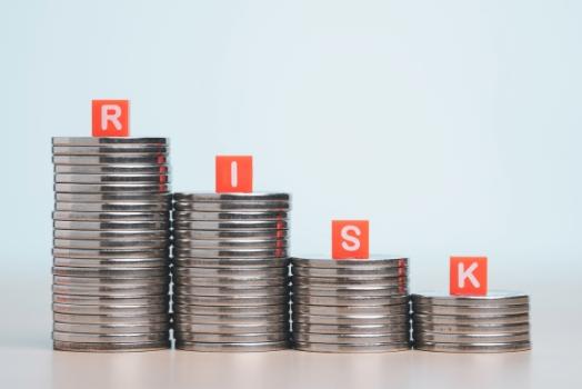 Coins in stacks high to low Risk letters