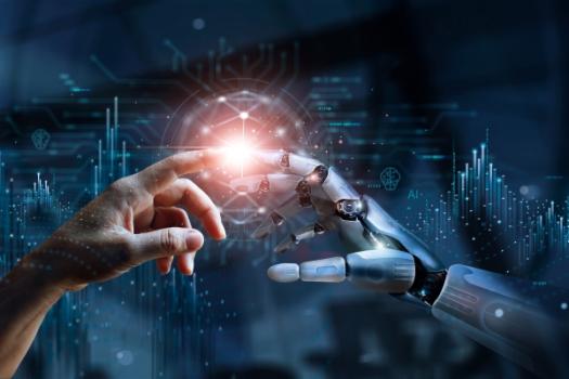 Human hand touching AI hand