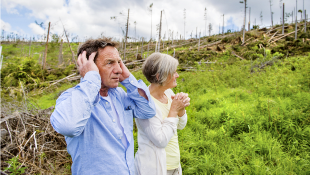 Corps Proposes $4.6B Plan to Steel Miami for Storm Surge Senior couple looking at hurricane damage