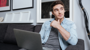 Moving Toward a Telework Future: A Checklist of Considerations for Employers Businessman working from home on laptop