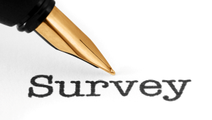 Survey Finds Tough Labor Market Top-of-mind for Busy Georgia Contractors Fountain pen pointing at the word Survey on a page