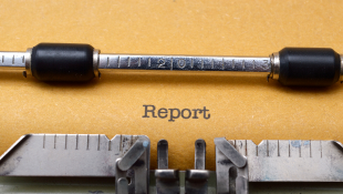 Report: Construction Firms Could Better Protect Workers From Noise Hazards Report on paper in typewriter