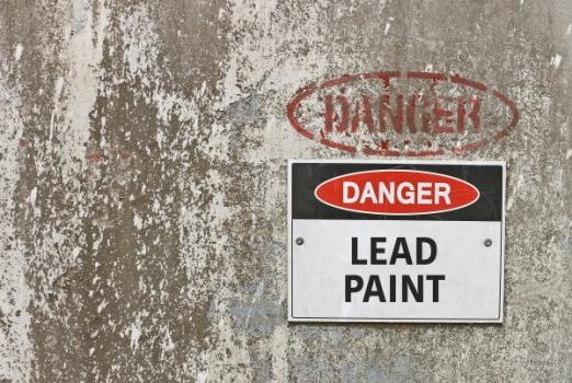 Danger lead paint sign on wall