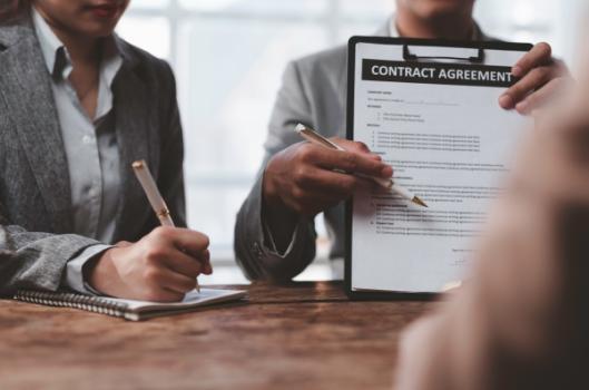 Someone pointing to clause in contract