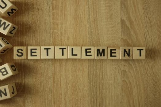 Settlement scrabble pieces