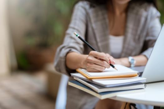 Woman taking notes