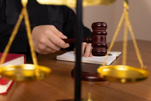 Judge with gavel and scale