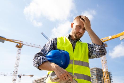Worried construction worker