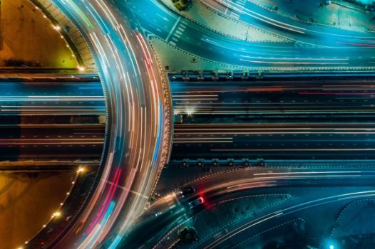 Blurred highway and bridge intersection