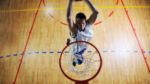 Basketball player shooting basket