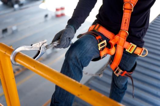 Construction Companies Are Nearly Seven Times Safer With These Best Practices Worker with safety harness
