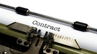 Contract in typewriter