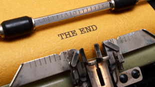 The end printed on paper in typewriter