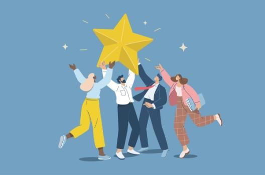 Business people holding up star