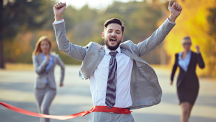 Businessman winning race