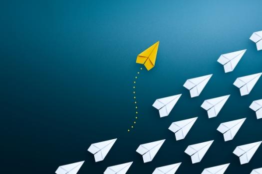 Yellow airplane flying its own path