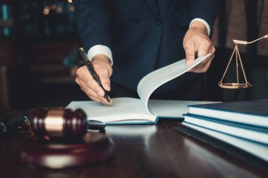 Judge signing document