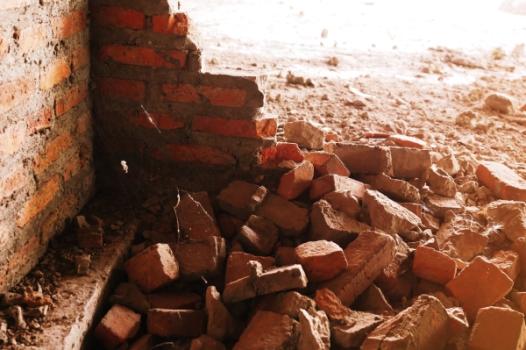 Bricks falling from building
