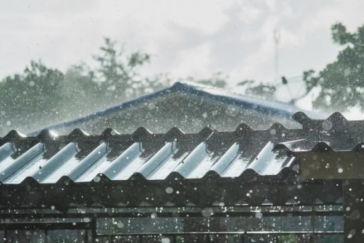 Hailstorm on metal roof