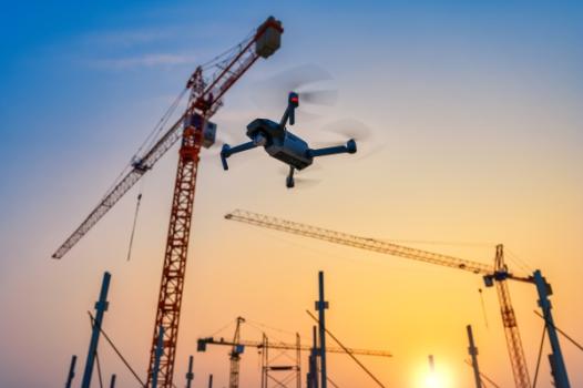 Eyes on the Sky: Regulating DJI Drones on Federal and Private Construction Sites Drone flying over construction site