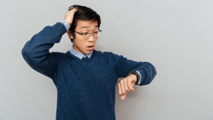 Man looking at watch