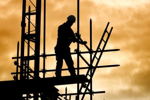 Employer’s Liability Exclusion Bars Coverage Scaffold worker at sunset