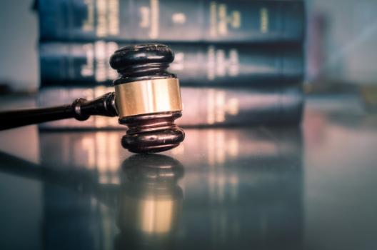 Insured’s Breach of Contract Claim Survives Motion to Dismiss, but Bad Faith Claim Does Not Gavel in front of the law books